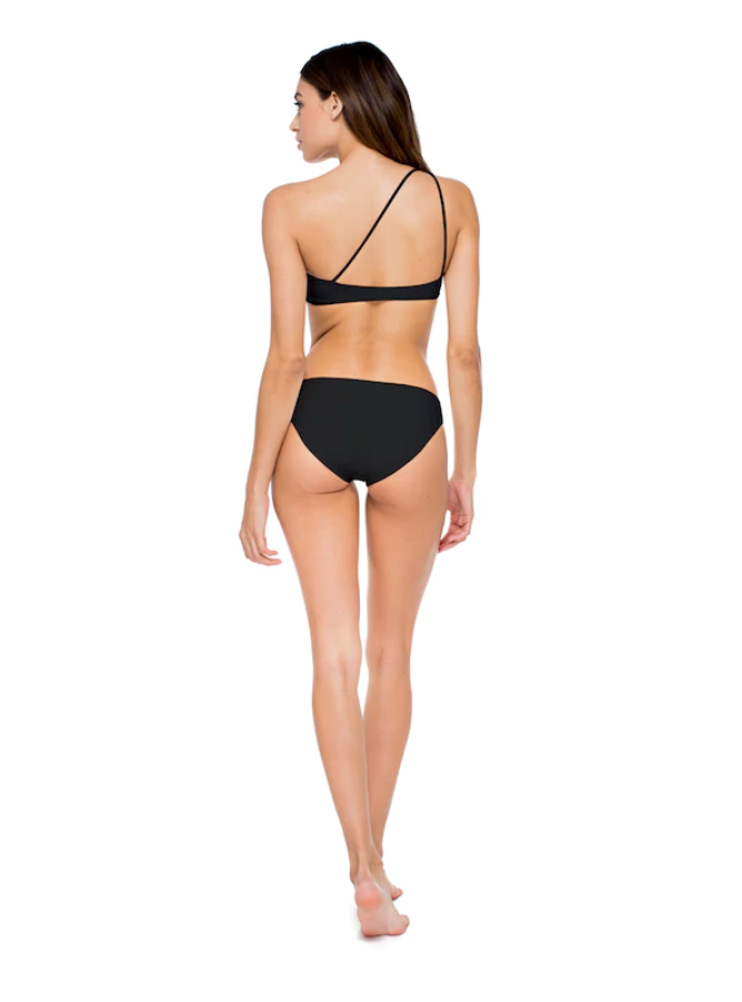 Load image into Gallery viewer, Model showing the back of the Apex Top and Lure Bottom in Black