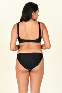 Model showing the back of the Rounded Edges Top and Lure Bottom in Black